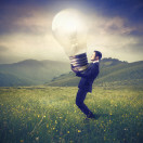Big idea - man holding bulb