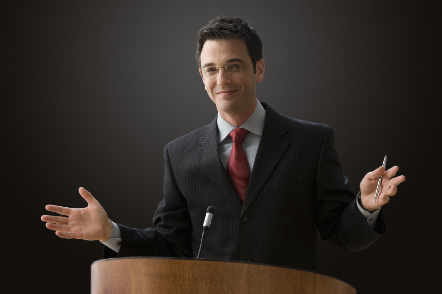 Businessman At Podium