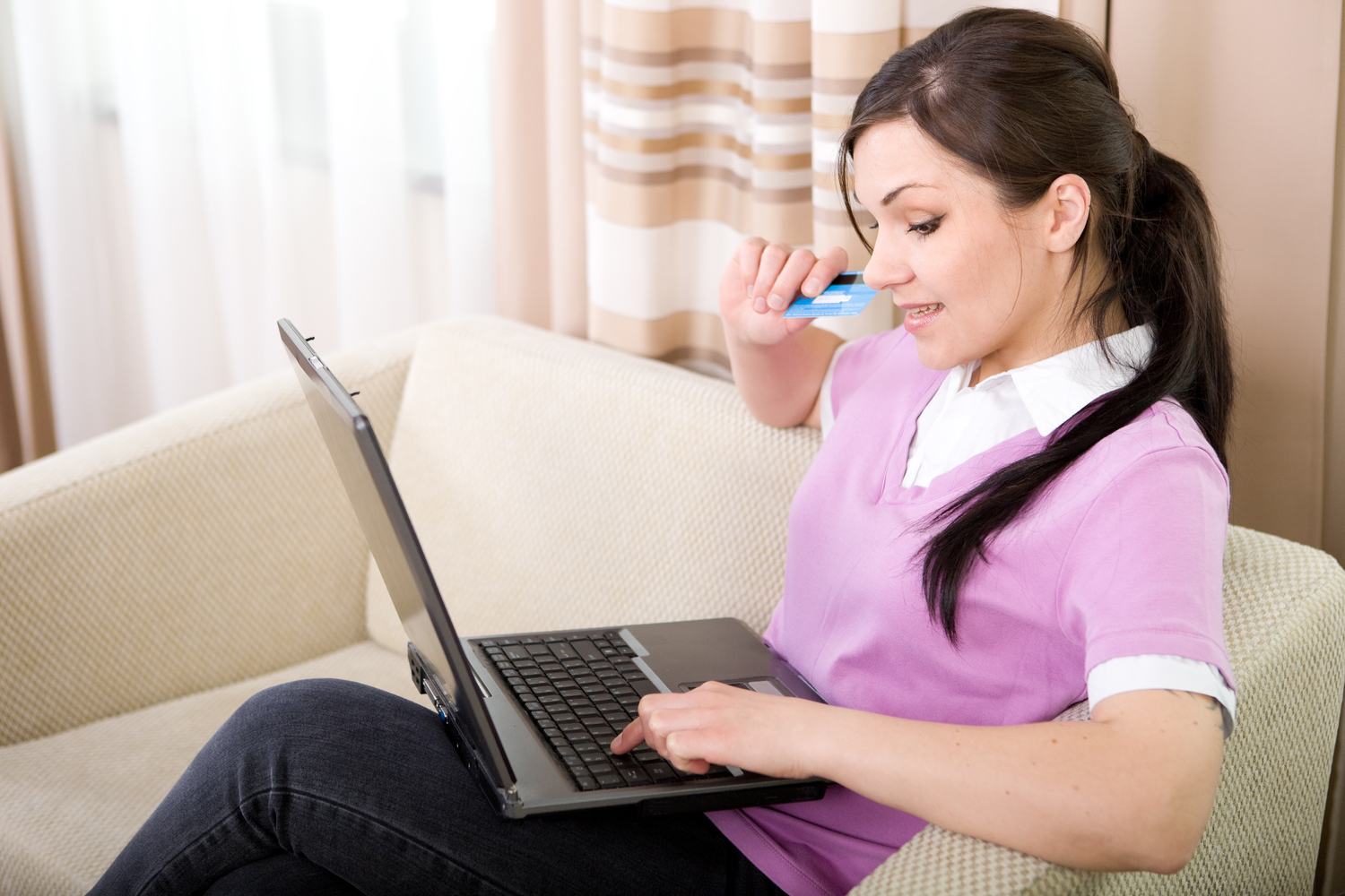 Woman With Laptop And Credit Card