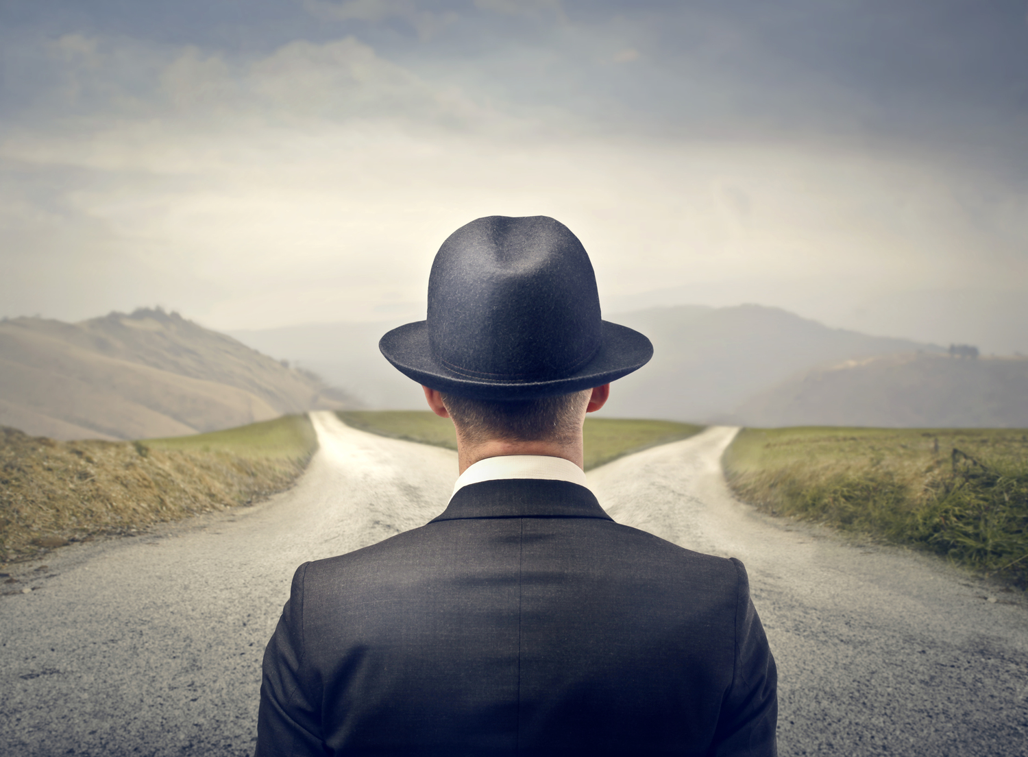 Man Choosing Between Two Roads