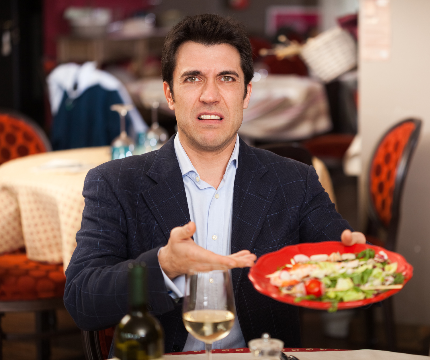 Male customer complaining about his food