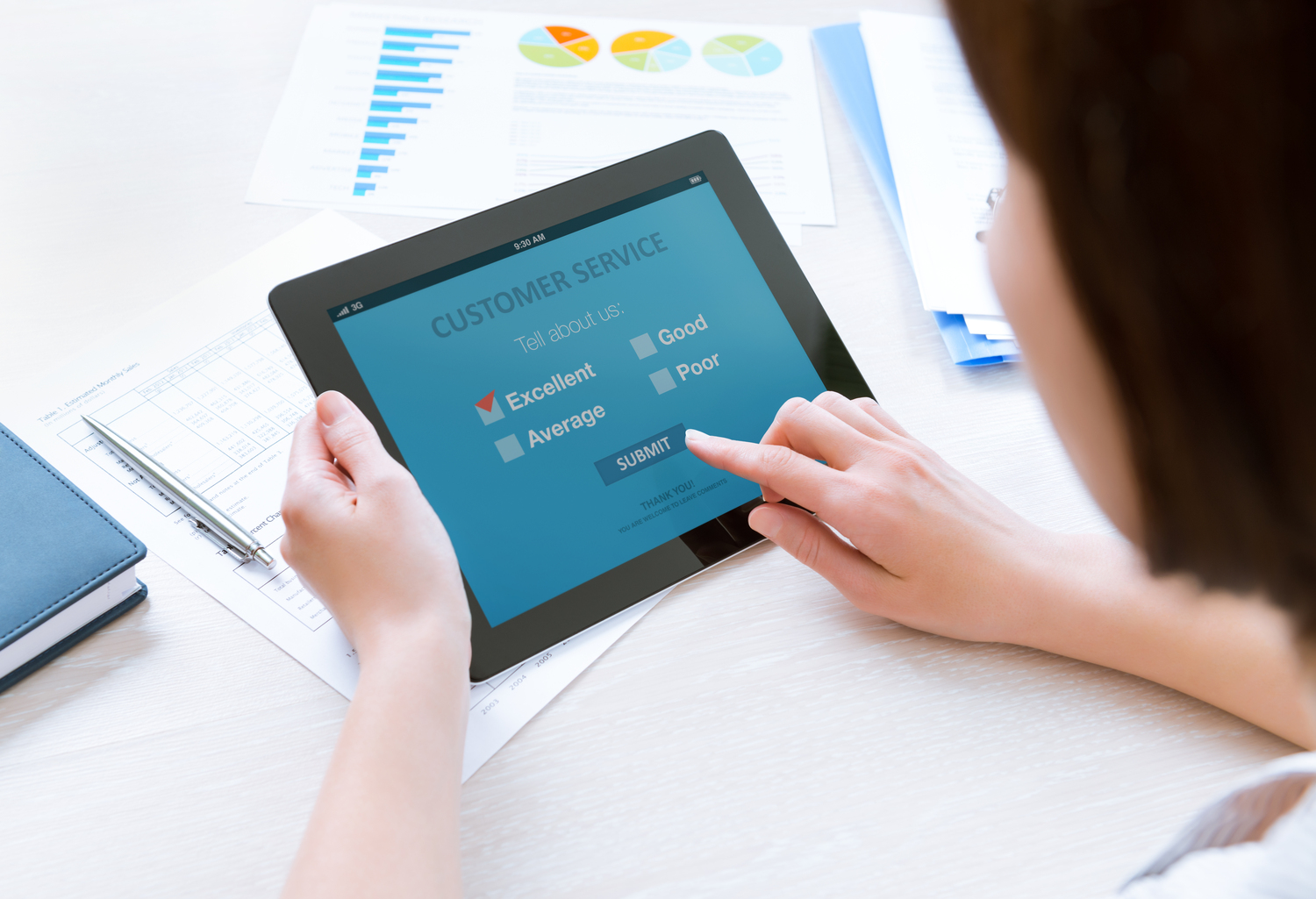 Woman Rating Customer Service on Tablet
