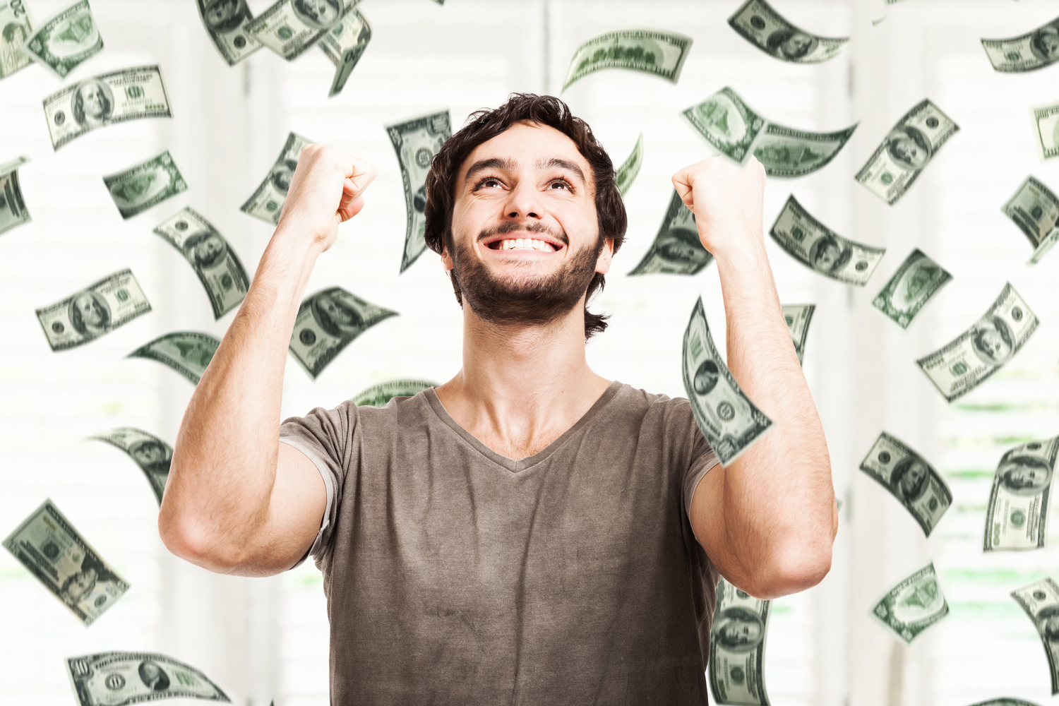 Man in rain of money