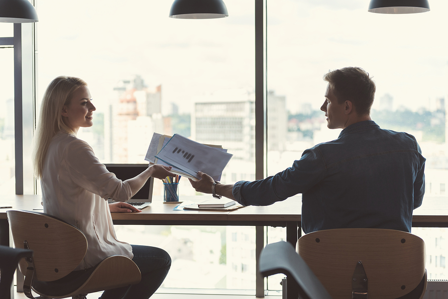 Handing over paperwork; VC funding concept