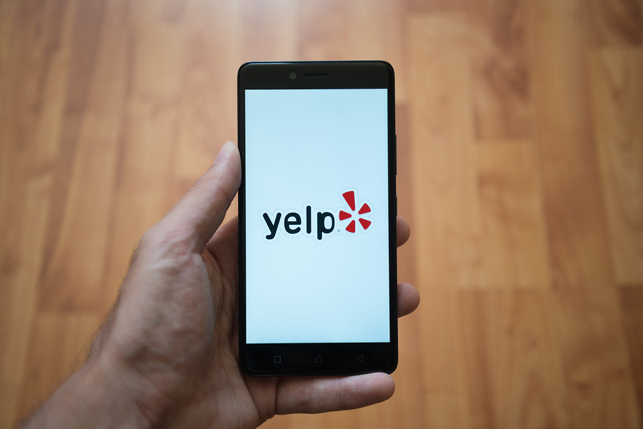 yelp review platform on smartphone; online reviews 